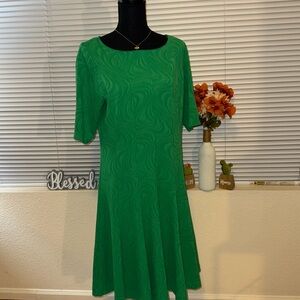 Danny and Nichole  size 14, green textured and pleated dress, split in the back.